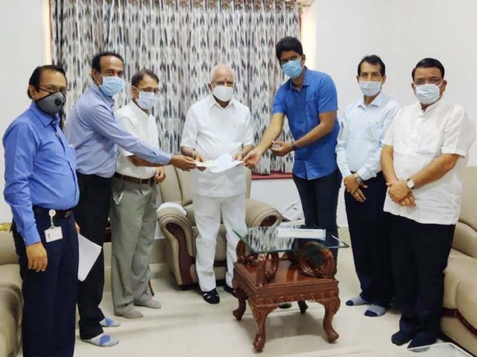 Toyota Kirloskar gave a check of two crore rupees to Honorable Chief Minister of Karnataka BS Yedurappa Toyota Kirloskar gave a check of two crore rupees to Honorable Chief Minister of Karnataka BS Yedurappa