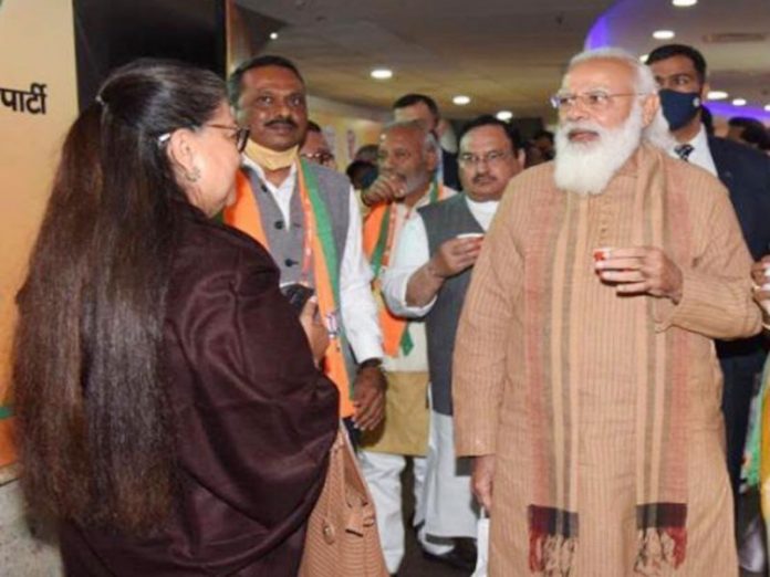 pm modi and vasundhra raje