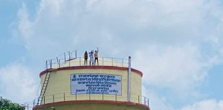 student on water tank