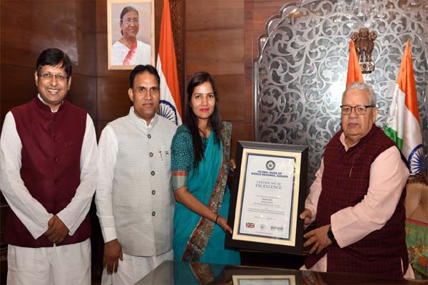 Nirmala Devi honored by the Governor