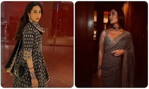 Kareena Kapoor wore a saree at the house party, while Karisma Kapoor was seen in a suit.
